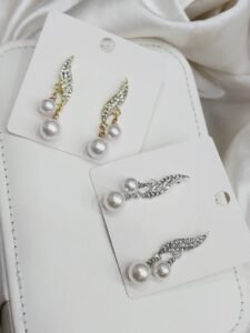 white pulse earrings