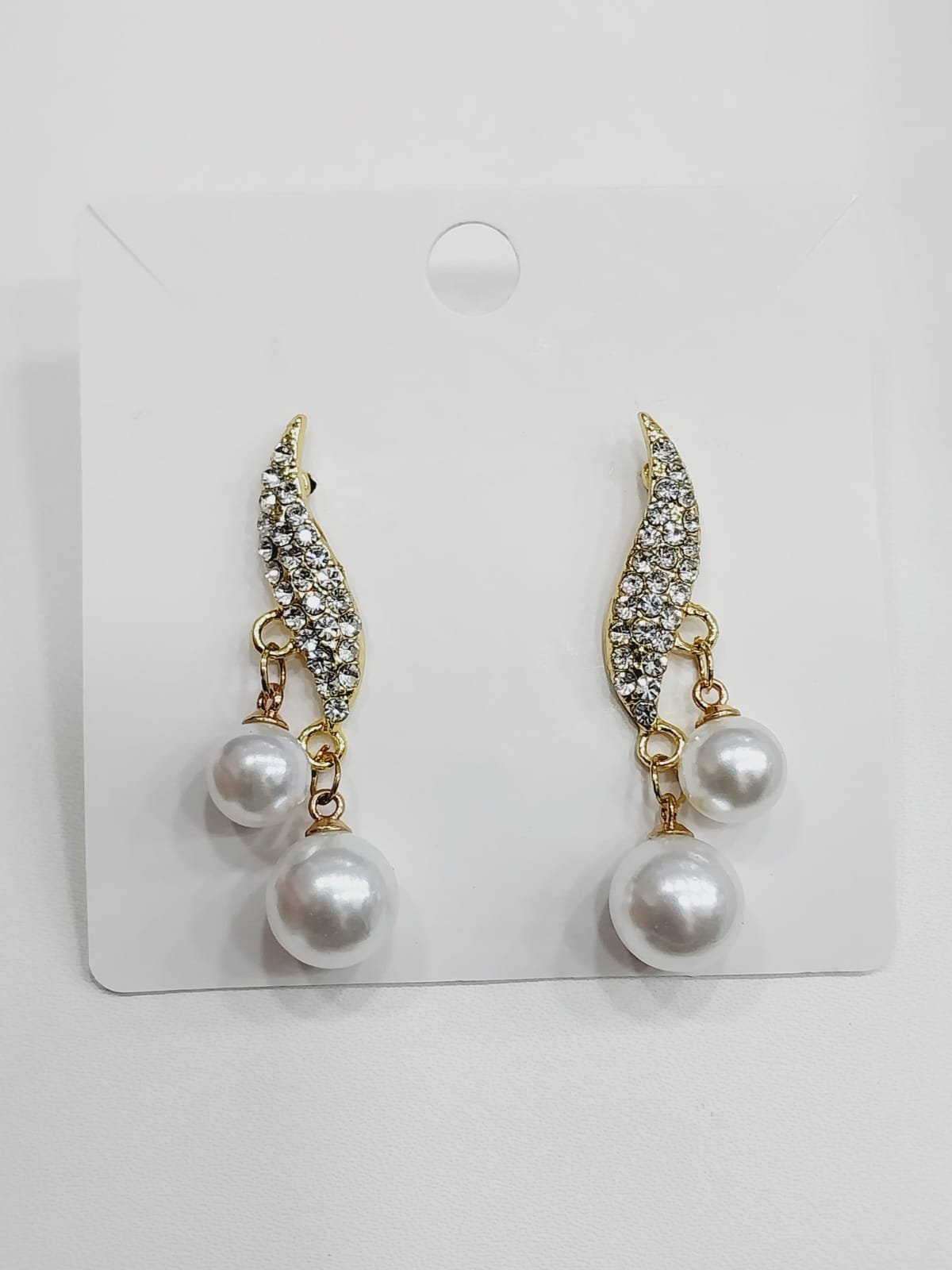 white pulse earrings