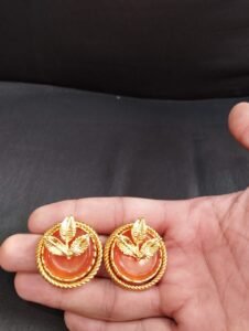 Gold-plated designer studs in real stones